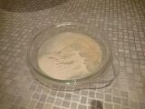 Dried codeine product from a cold water extraction on a pyrex tray.